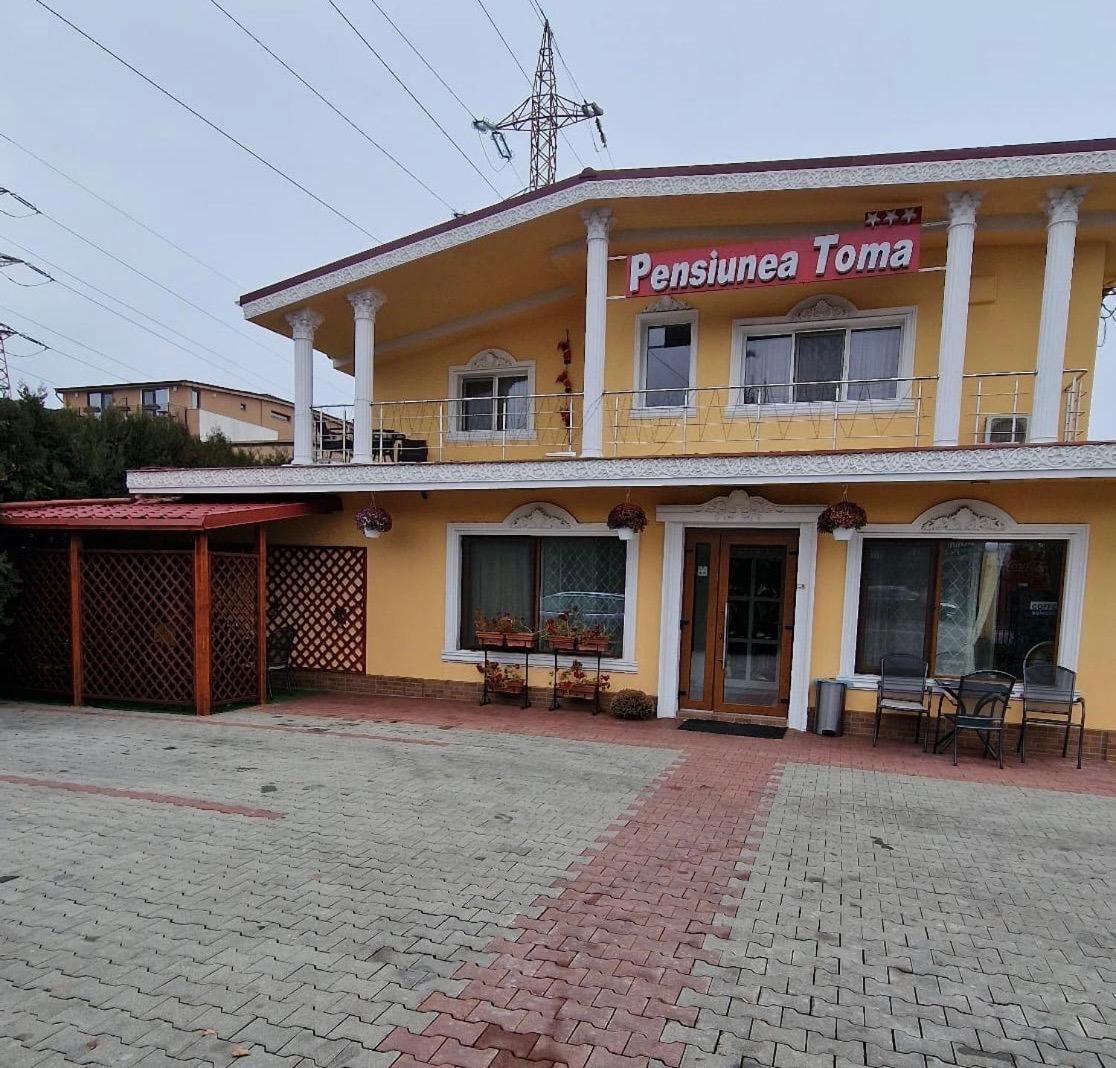 Pensiunea Toma โปลเยชต์ ภายนอก รูปภาพ